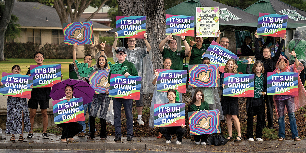 GIving Day sign waving