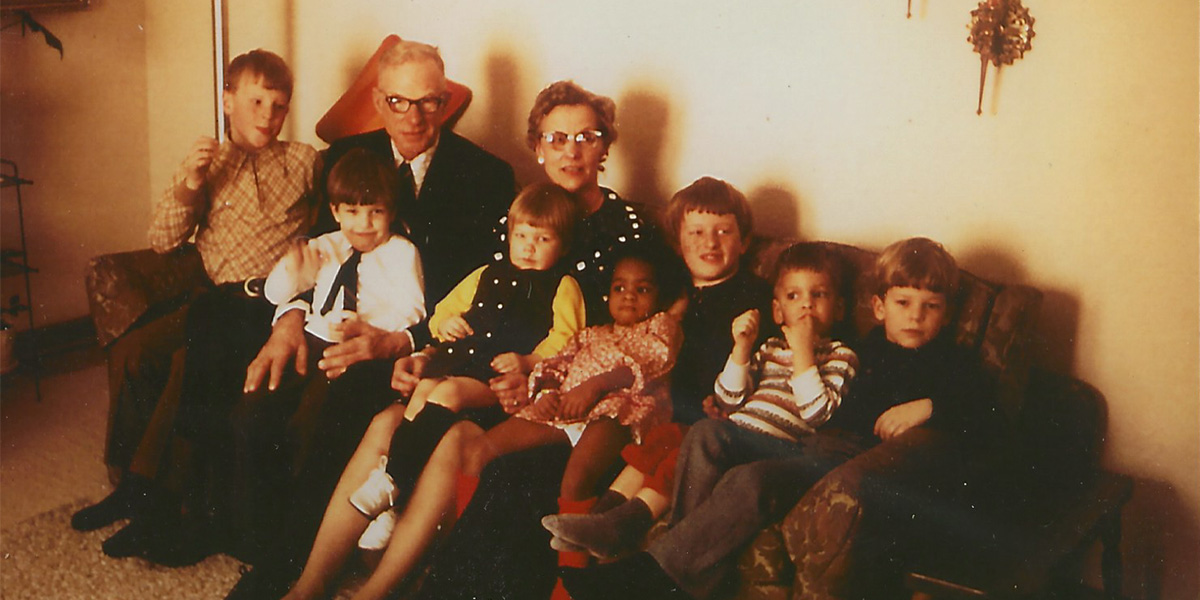 Mark with grandparents on couch