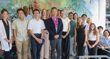 Aki Kasai and Hokkaiko University staff