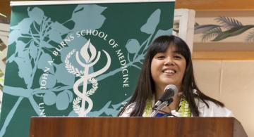 Britney (Kanoe) Quibelan, an MD Candidate in the JABSOM Class of 2020, at the lectern. Deborah Dimaya photo