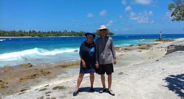 Fran and Kirk Alexander on a beach in Rangiroa in 2018
