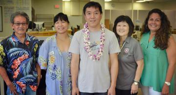 Chi and his family with the Learning Centers current tutors