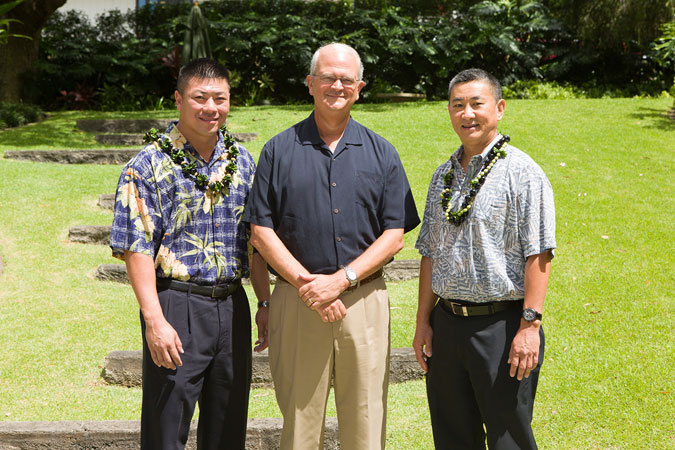 (From l-r) Aaron Sato, FEI Hawaii Chapter president; Vance Roley, dean of the Shidler College of Business; Randall Kawano, FEI Hawaii Chapter treasurer
